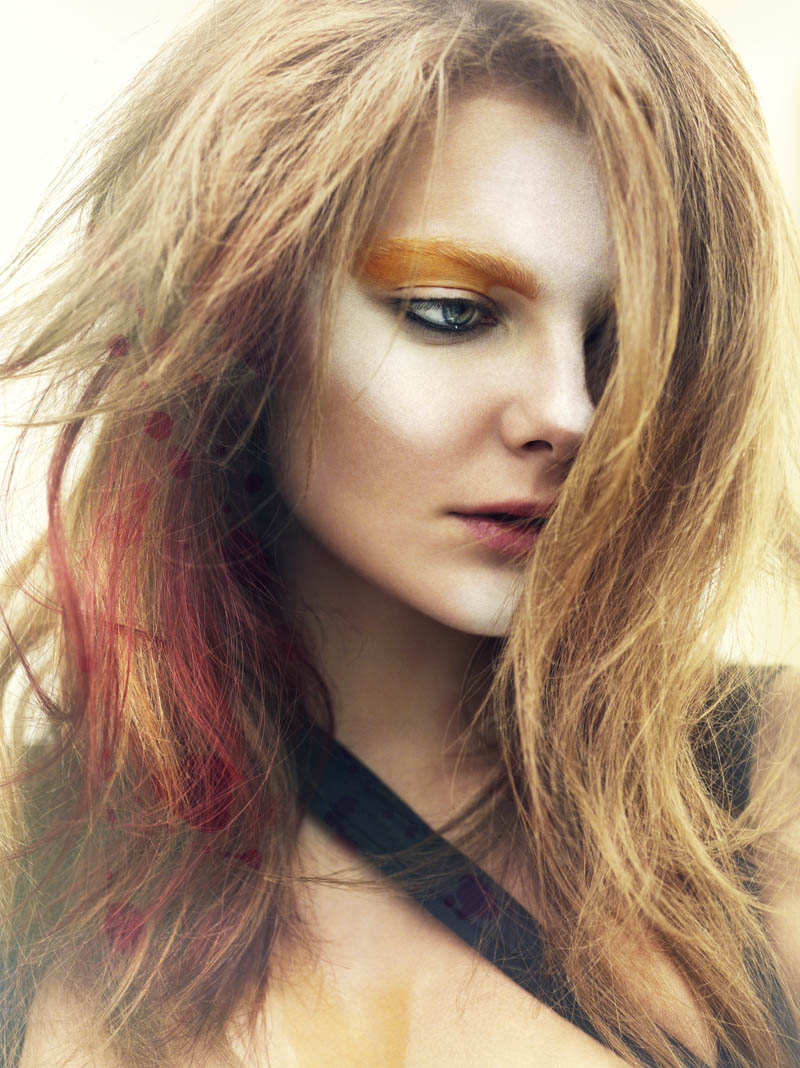 Eniko Mihalik wasn't afraid to get messy for a beauty story in Vogue Italia May. / Photo by Greg Kadel