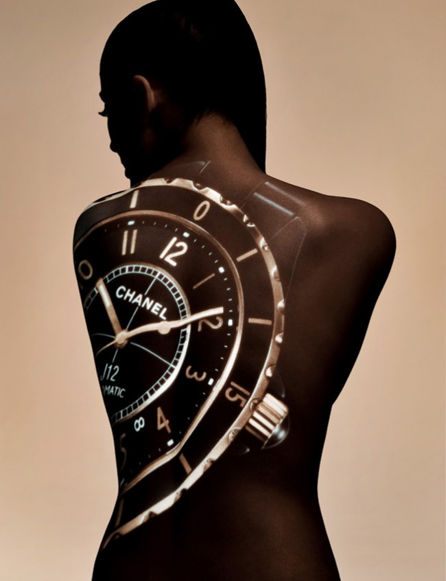 Alina wore watches and little else in Numéro China's June issue. / Photo by Charles Guo